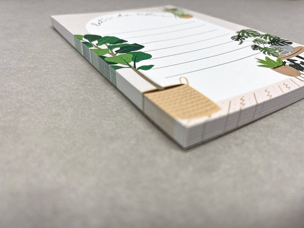 Side view of Home notepad showing stack thickness