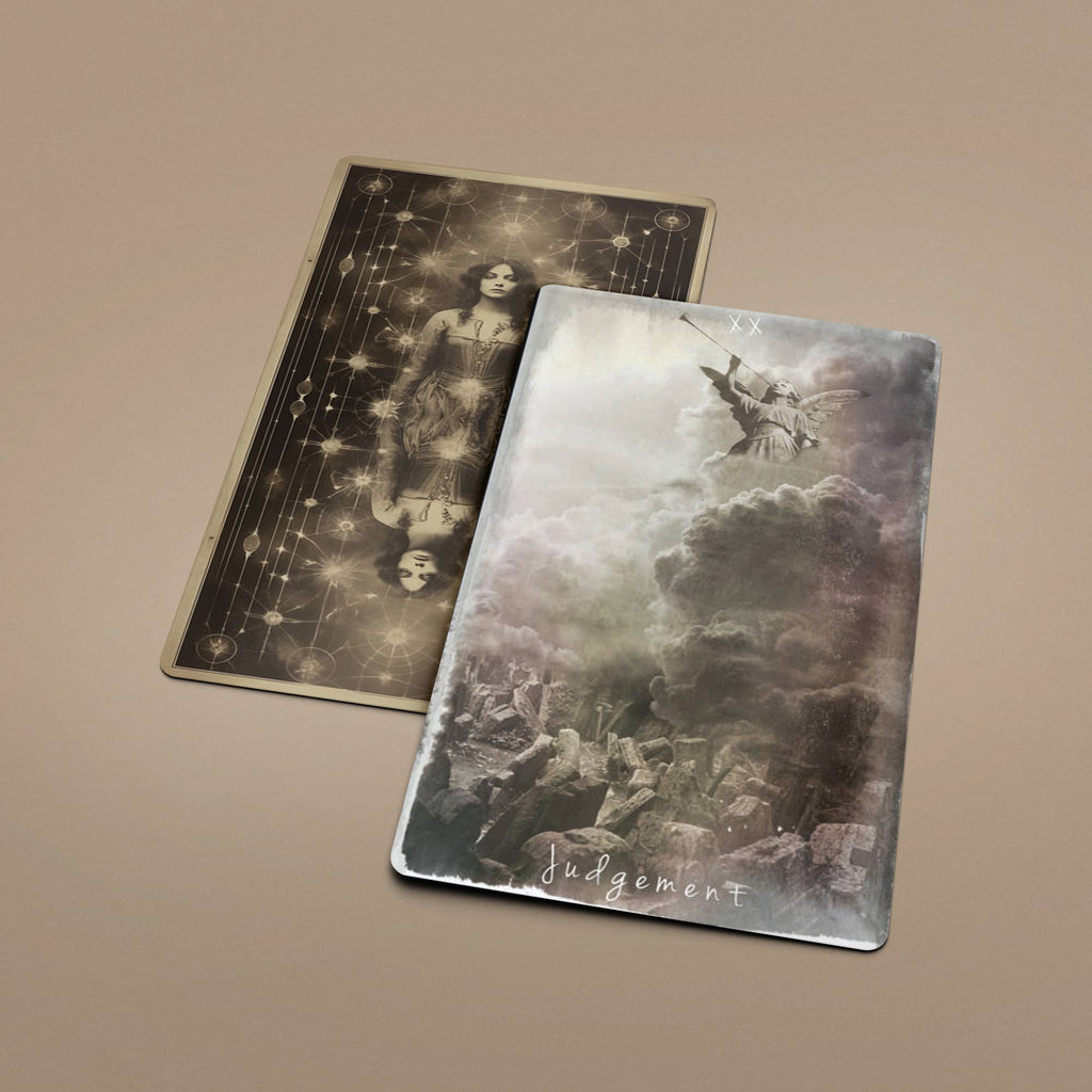 Two Tarot of Unknown Shadows cards lying flat showing Judgement and another card