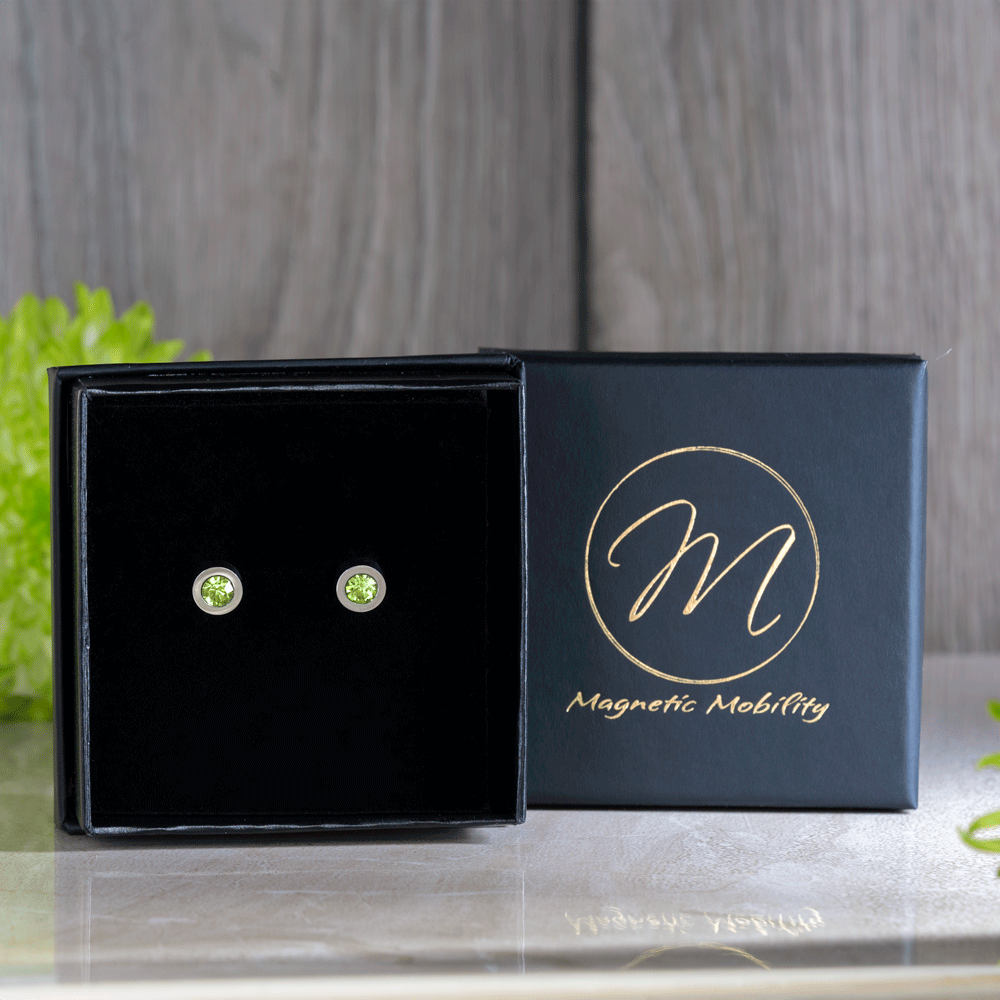 Magnetic Mobility Birthstone Magnetic Stud Earrings – gallery view – multiple Swarovski birthstone colourways in presentation boxes.