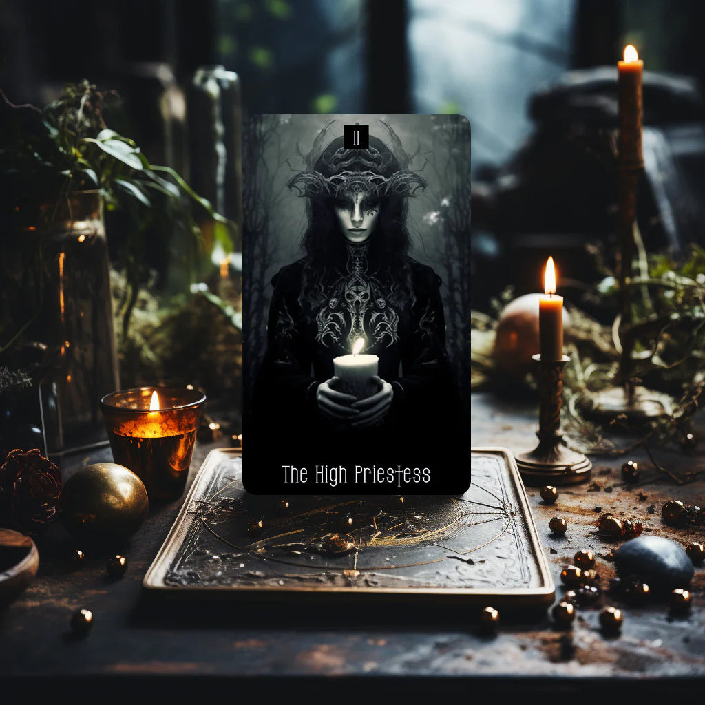 Dark Beauty Tarot card The High Priestess displayed on a candlelit altar in a dark forest setting