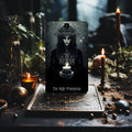 Dark Beauty Tarot card The High Priestess displayed on a candlelit altar in a dark forest setting