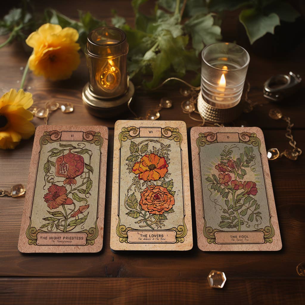Dark Synevyr Botanica Oculta Tarot Deck 80 Cards - tarot deck card photographed beside a cup and flowers