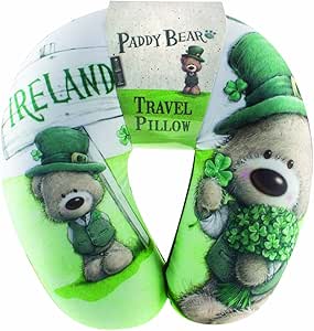 U-shaped travel pillow featuring an illustration of Paddy Bear wearing a green hat and waistcoat, holding shamrocks next to an Ireland sign