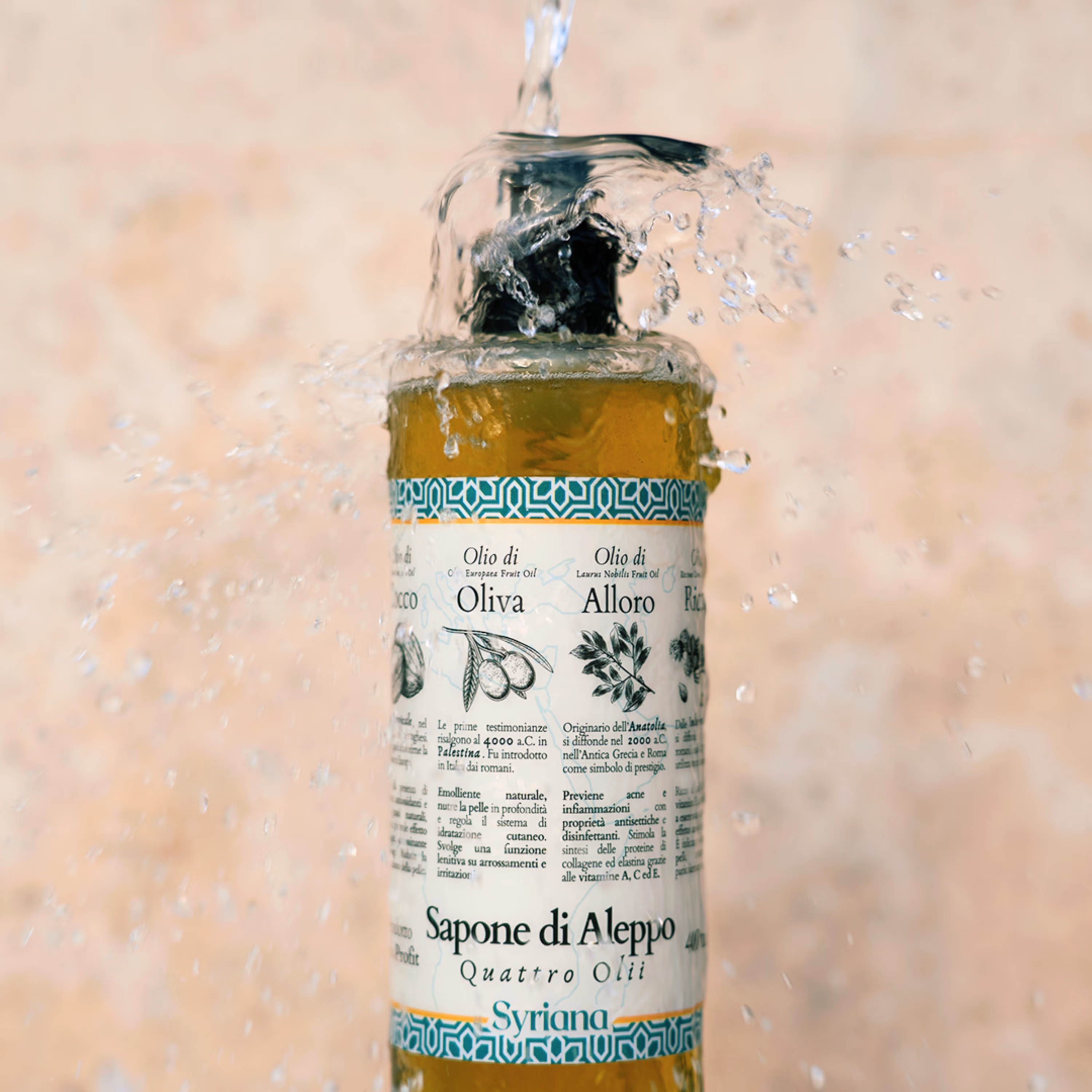 Syriana Quattro Olii Liquid Aleppo Soap 400ml - bottle being rinsed with splashing water